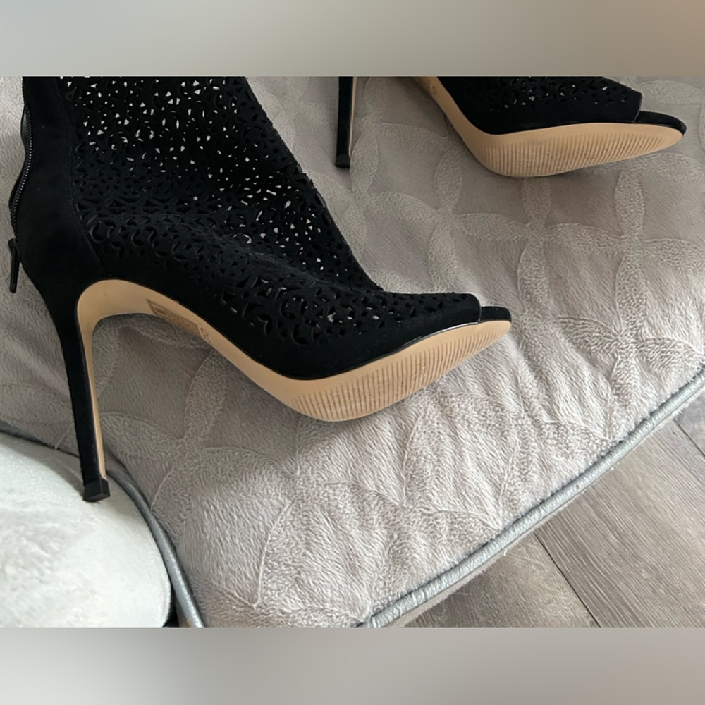 Women’s open toed boot/shoes.